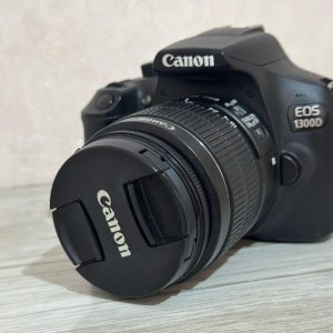 دوربین دیجیتال کانن مدل EOS 1300D  به همراه لنز 18-55 میلی متر DC III